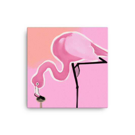 Pink flamingo teetering to eat